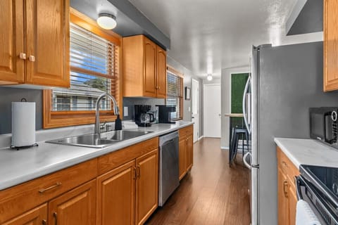 Kitchen has plenty of counter space and storage!