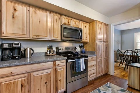 Fully Stocked Kitchen with Pots and Pans, Bakeware, Mixer, Crock Pot, and tons of Spices! Makes Dining in a Breeze!