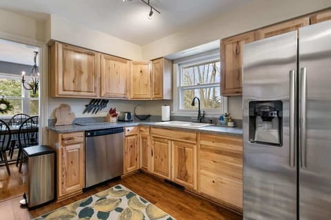 Open Kitchen flows into both the Dining Room and Family Room