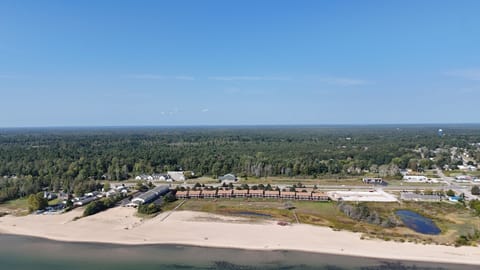 OVERVIEW:  The gorgeous lakefront and private sandy beach for the condo development
