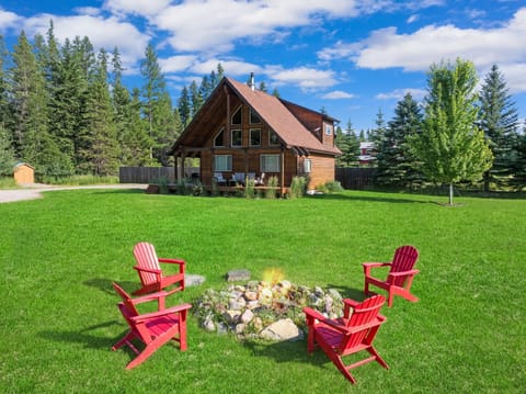 Fire pit with Adirondack chairs