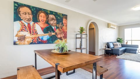 Connected to the living area and kitchen, you'll find a dining area which accommodates 4 guests