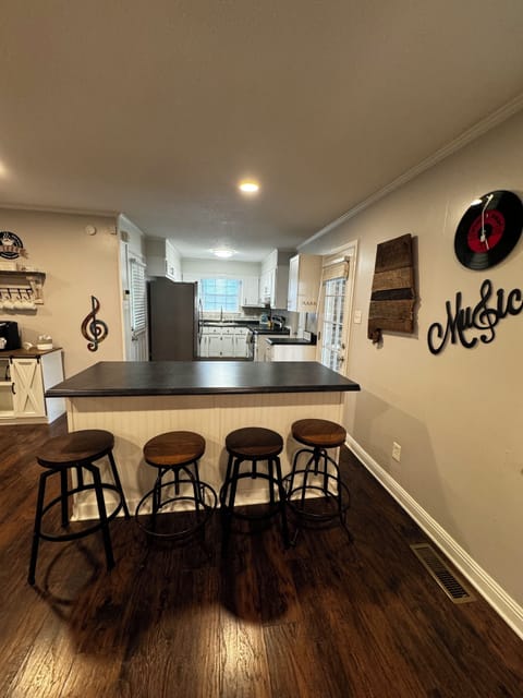 Kitchen with extra sitting area, fully stocked kitchen with dishwasher. 