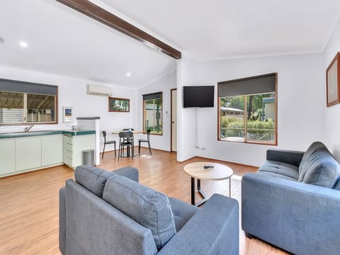 Standard 2 Bedroom Cabin | Living area | 43-inch LED TV with digital channels
