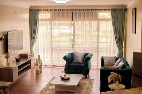 Luxury Apartment, Hill View | Living area | TV