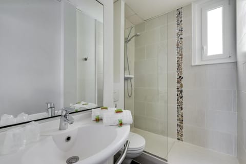 Shower, free toiletries, hair dryer, towels