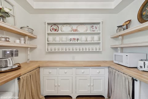 Pantry with Two Cuisinart Coffeemakers. Both with Keurig and Pot. Pods Provided