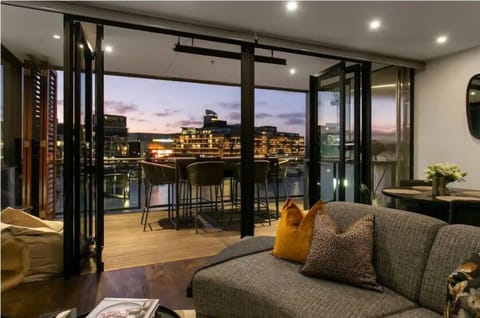 A light filled living room leads to the Terrace offering beautiful Marina views