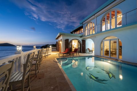 Enjoy an evening swim as the sunset paints the sky in vibrant hues.