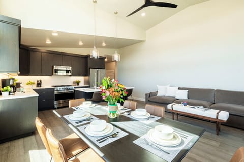 Open floor plan with a high ceiling