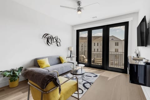 Unwind in the chic living room & stream your favorites on the smart TV