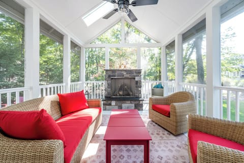 Gorgeous Screened In Porch With Fireplace