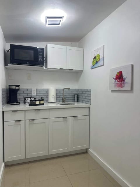 Small but mighty! This kitchenette is fully equipped for quick and easy meals.