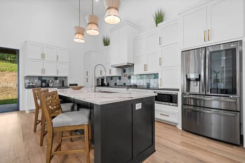 Upgraded kitchen, fully stocked with cooking essentials to prepare meals just like home.