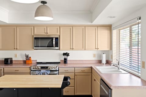 Storage galore! Our kitchen features tons of cabinetry to keep everything organized and within reach.