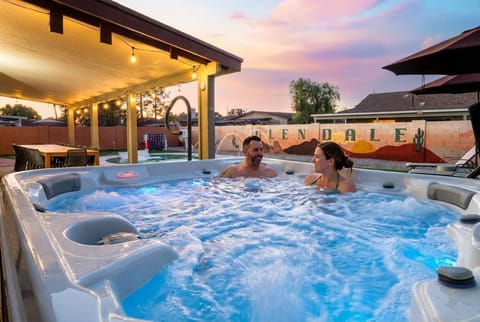 Unwind in the glow of the night! Our hot tub is ready for a relaxing evening soak