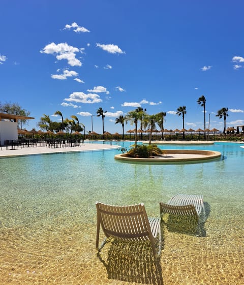 Indoor pool, 2 outdoor pools, pool umbrellas, sun loungers