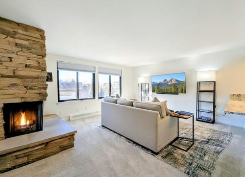 Cozy Living Room with Fireplace and TV