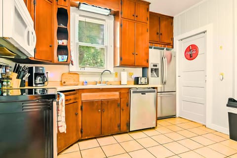 A character-filled kitchen w/ vintage cabinets & all the essentials for comfort