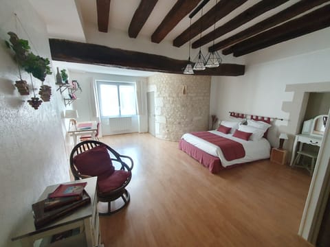 Bedroom 1 : a double bed 140x190, dressing table, reading corner, wardrobe and desk