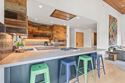 Spacious kitchen with high end appliances and plenty of counter space for meal prep