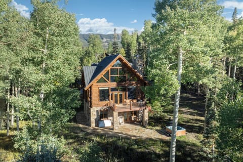 Exterior view of Bear Lodge with private outdoor hot tub