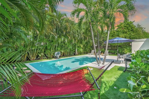 Backyard | Outdoor paradise. Offers heated swimming pool, lounge chairs, BBQ grill, dining table, shower, hammock, meditation space, and pool basketball.
