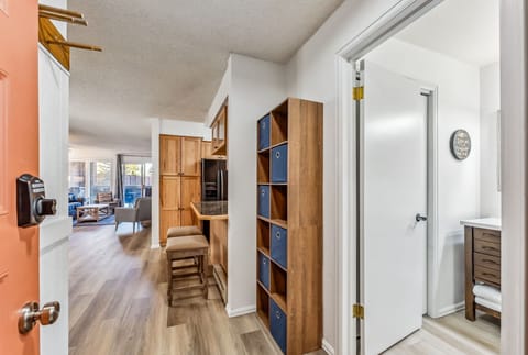 Entryway: Storage space, coat hooks, opens to main living space