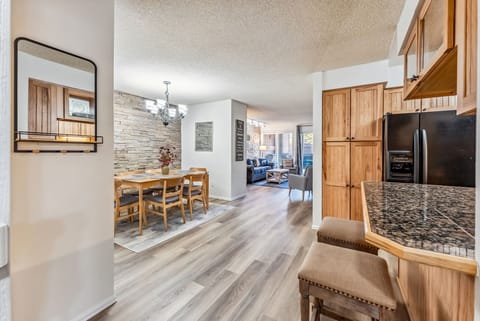 Kitchen & Dining Room: Open layout, well-equipped kitchen, kitchen bar w/2 bar stools 6-person dining table
