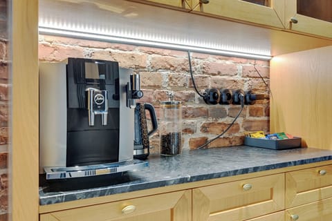 Superior Apartment, City View | Private kitchenette | Fridge, stovetop, dishwasher, coffee/tea maker