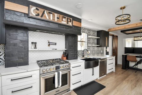 Cook with ease and style using our modern stainless steel stove and oven, perfect for preparing delicious meals in the heart of the kitchen.