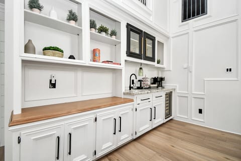 Cook and entertain in style in this spacious kitchen, designed for both functionality and comfort.