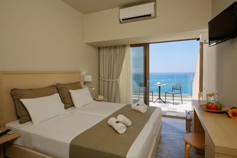 Superior Studio, Sea View | In-room safe, desk, laptop workspace, blackout drapes
