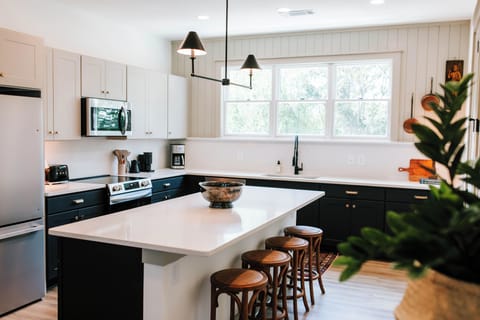 Cook up a feast in our stylish kitchen, complete with top-notch appliances and elegant decor!