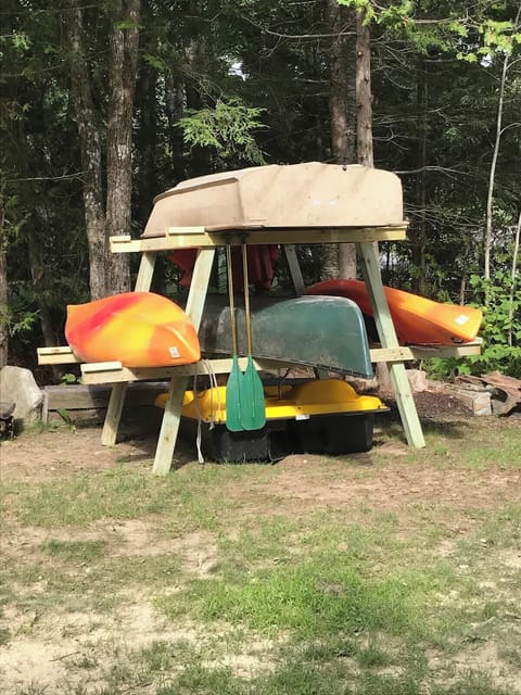 Two kayaks, a canoe, paddles, and life jackets are available for guests to use.