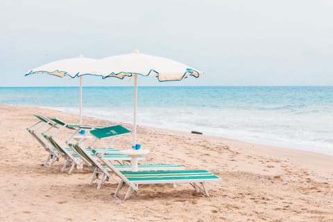 Private beach nearby, sun loungers, beach umbrellas