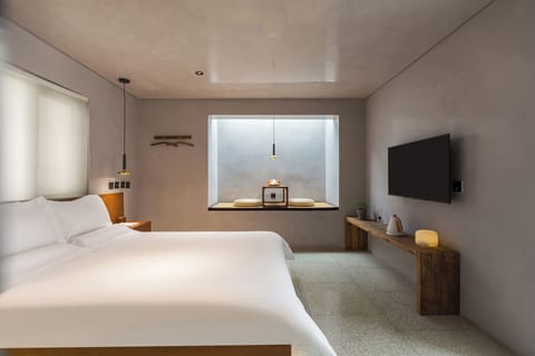 City Room | Desk, laptop workspace, blackout drapes, soundproofing