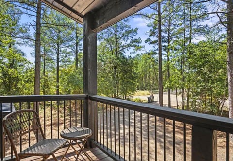Sip, sit, and relax. Enjoy the tranquility of the forest from this charming patio. It's the secluded spot you've been looking for to unwind and breathe in the fresh air.