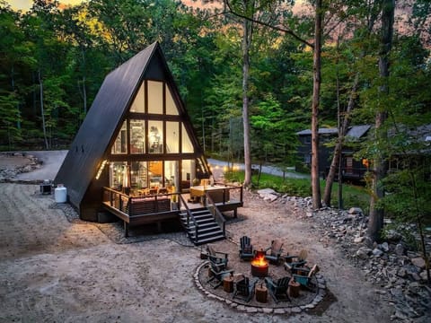Your A-frame hideaway with a fire pit ready for mountain nights.