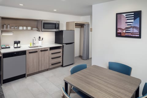 Suite, 1 Bedroom | Desk, laptop workspace, blackout drapes, iron/ironing board