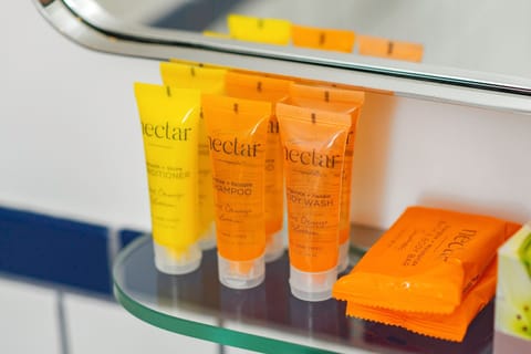 Basic Room, 1 Queen Bed | Bathroom amenities | Shower, free toiletries, hair dryer, towels