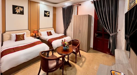 Deluxe Triple Room | Bed sheets