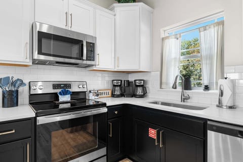 The kitchen is stocked with all necessary cooking utensils and appliances, ready for you to cook up your favs!