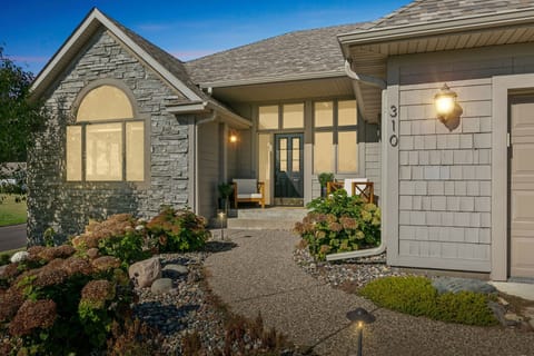 Sit on the front porch and watch the kids play in this family-friendly neighborhood