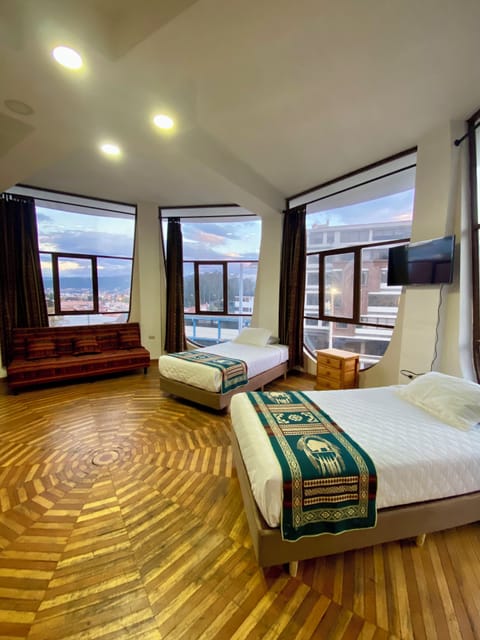 Family Triple Room, City View | Laptop workspace, WiFi (free)