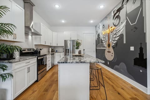 The airy layout and chic design make this kitchen a joy to cook and entertain in.