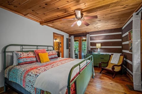 Master bedroom with king bed and private full bathroom.