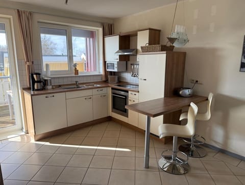 Apartment | Private kitchen | Electric kettle, toaster, highchair