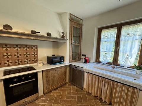 Villa | Private kitchen | Fridge, microwave, oven, dishwasher