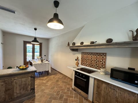 Villa | Private kitchen | Fridge, microwave, oven, dishwasher